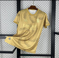 Maillot Real Madrid Gold entraînement 2025-2026 édition or avec logo